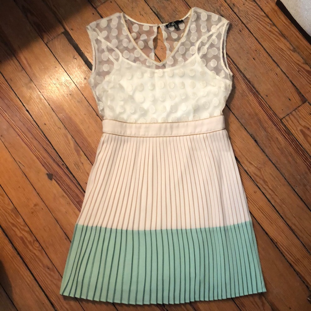 Sleeveless Dress with Pleated Skirt